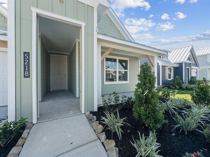 Front exterior of a new home in Grand Cay Harbour, Texas City, TX, highlighting curb appeal (Image 2). Front exterior of a new home in Grand Cay Harbour, Texas City, TX, highlighting curb appeal (Image 2).