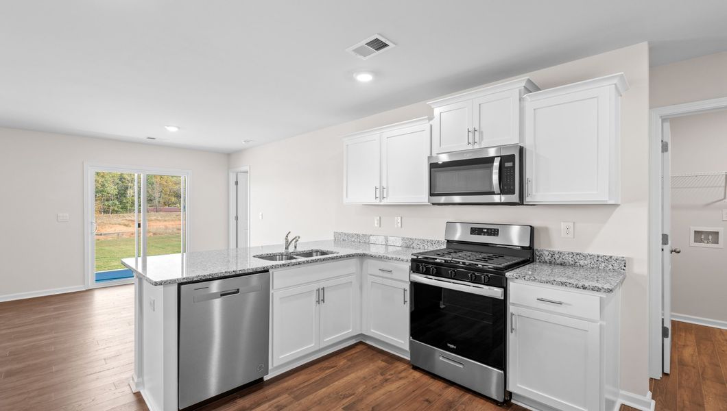 Representative furnished interior of a home built from the Macon by D.R. Horton in Lightwood Cottages, Moore (Image 5).