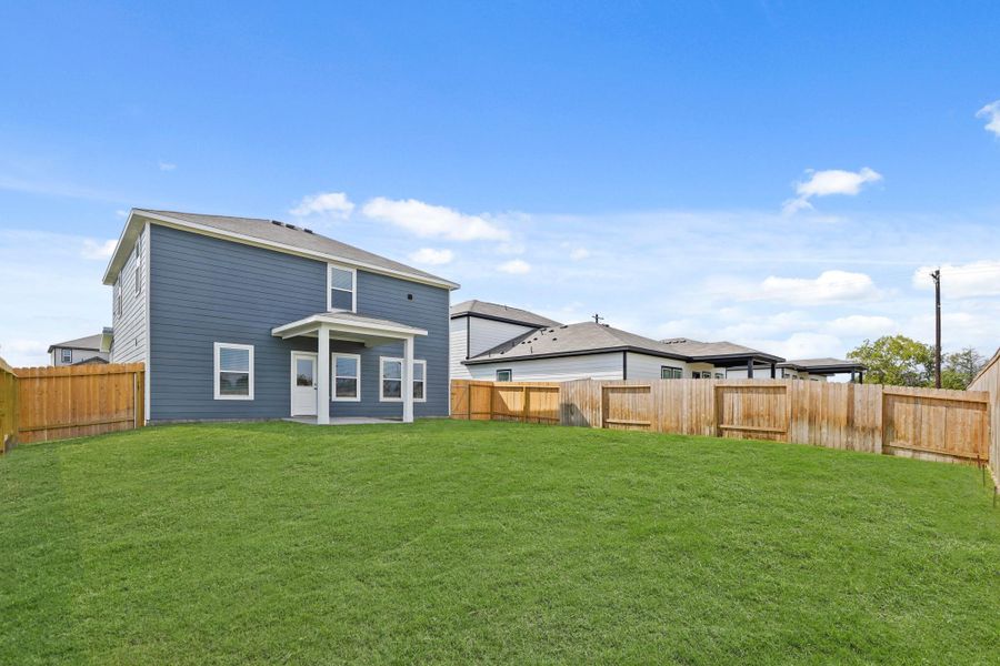 Exterior details and patio area of a home in Reveille Estates, Bryan (Image 3).