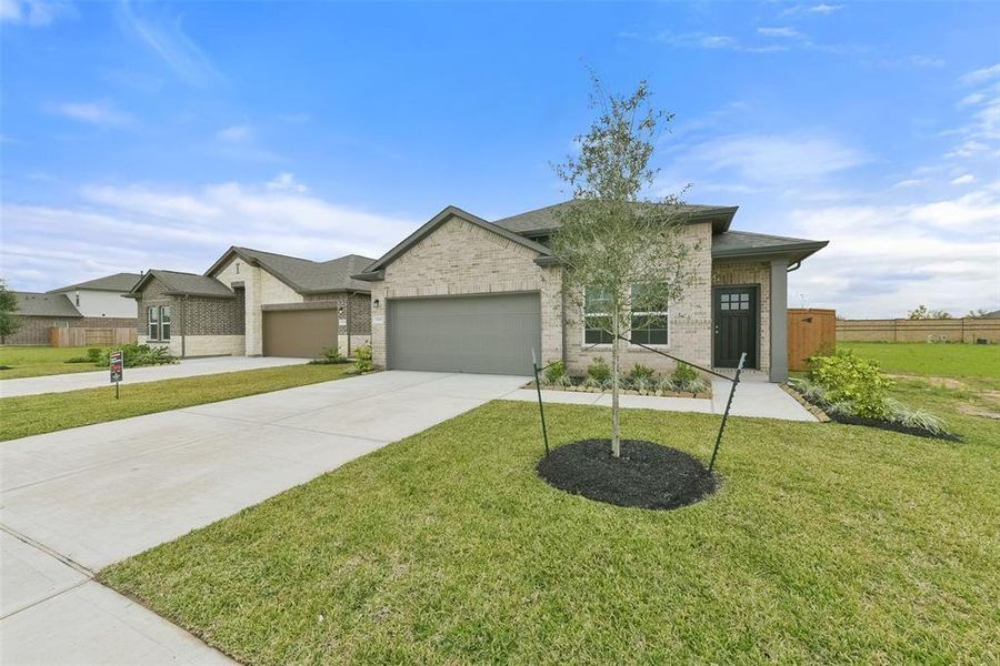 Front exterior of a new home in Emberly, Beasley, TX, highlighting curb appeal (Image 1). Front exterior of a new home in Emberly, Beasley, TX, highlighting curb appeal (Image 1).