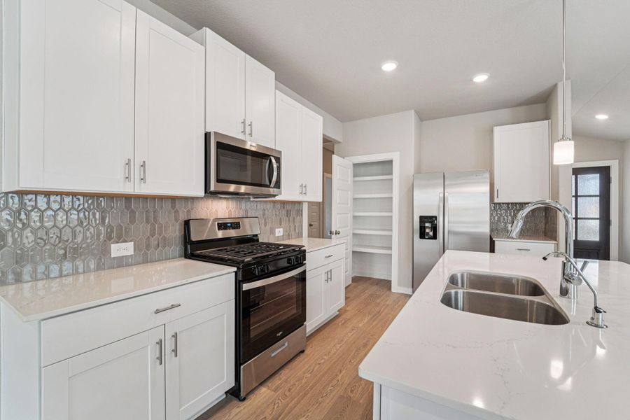 Photo is not of the actual home, but is an inspirational photo of builder’s model home and may depict options, furnishings, and/or decorator features that are not included