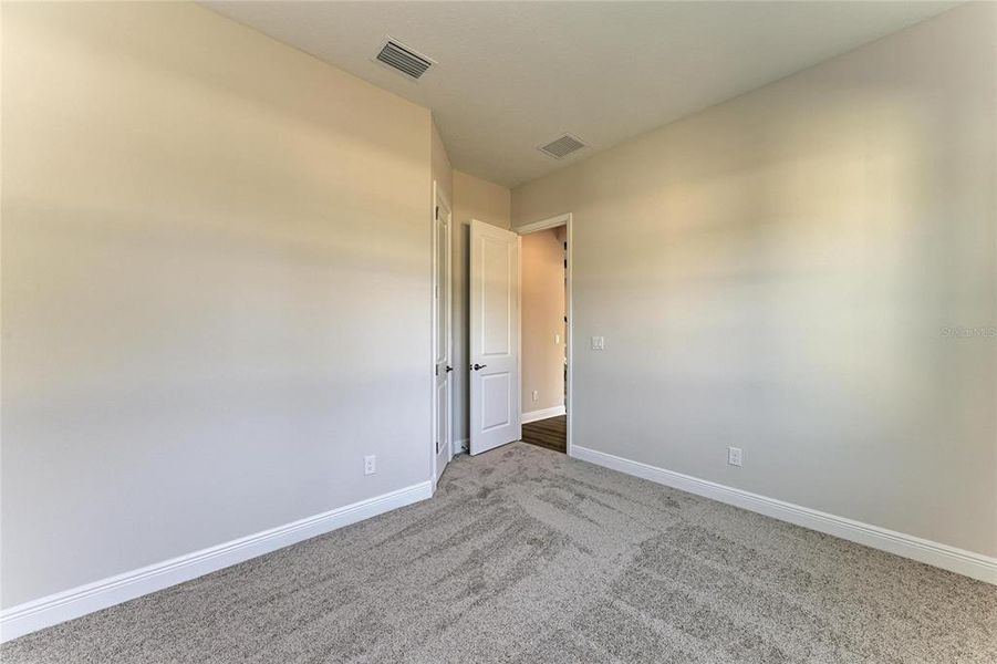 Spacious, unfurnished interior of a new home in Hidden Lakes, Brandon (Image 25).