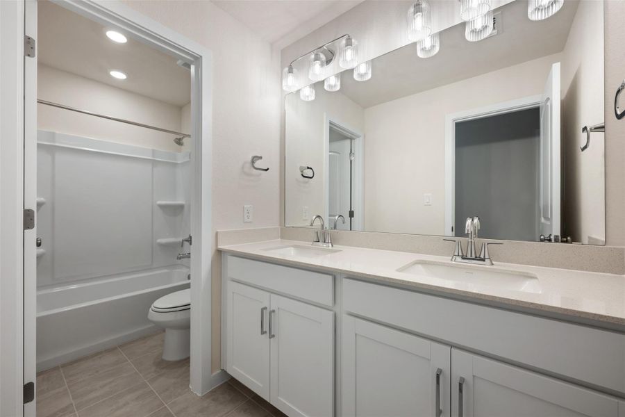 Furnished interior view inside a new home in Rolling Glen, Hutto (Image 11).