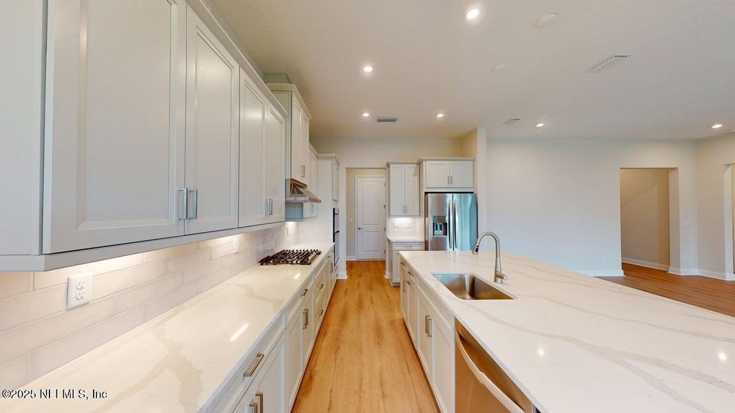 Furnished interior view inside a new home in RiverTown - WaterSong, St. Johns (Image 3).