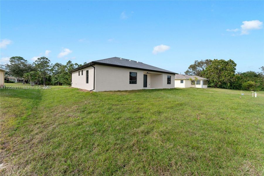 Exterior details and patio area of a home in , Lehigh Acres (Image 20).