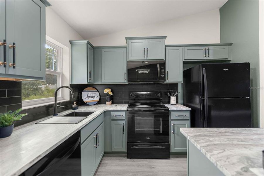 Furnished interior view inside a new home in , Dunnellon (Image 8).