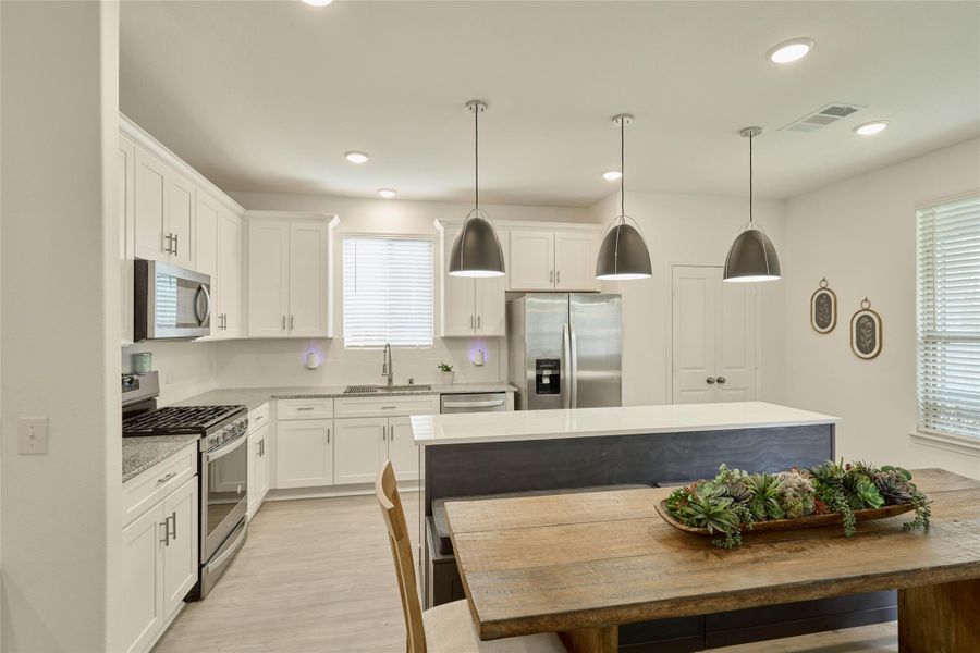 Furnished interior view inside a new home in The Pines At Seven Coves, Willis (Image 12).