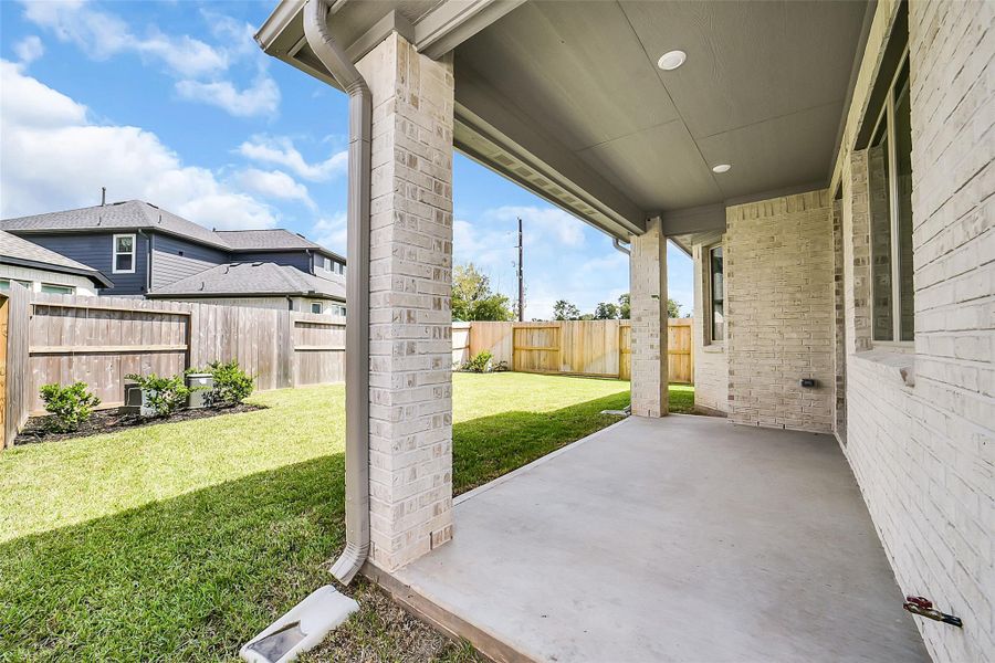 Exterior details and patio area of a home in Sienna 40', Missouri City (Image 2). Exterior details and patio area of a home in Sienna 40', Missouri City (Image 2).