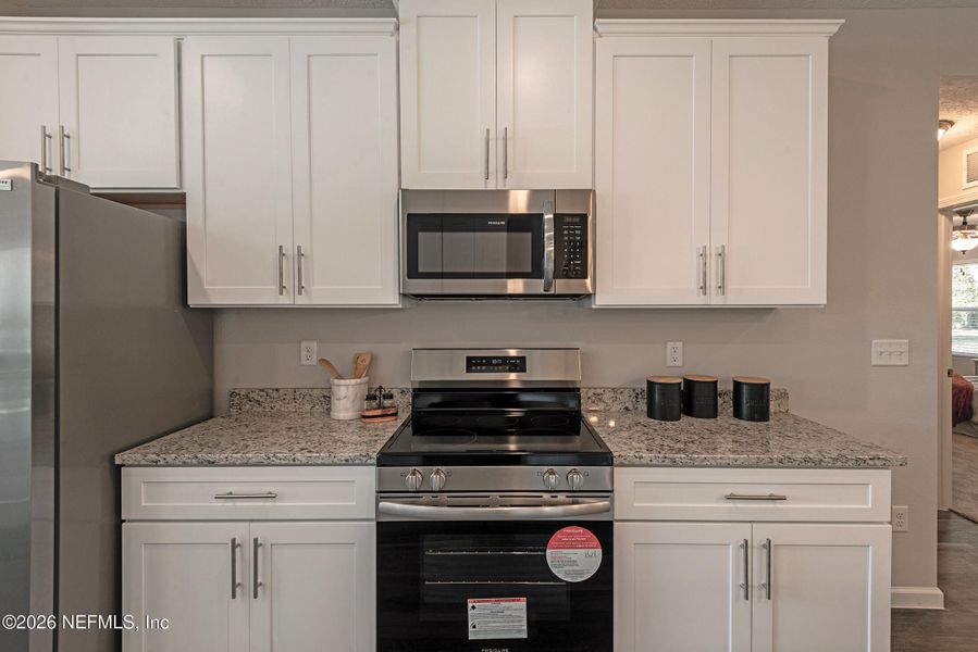 Furnished interior view inside a new home in , Jacksonville (Image 27).