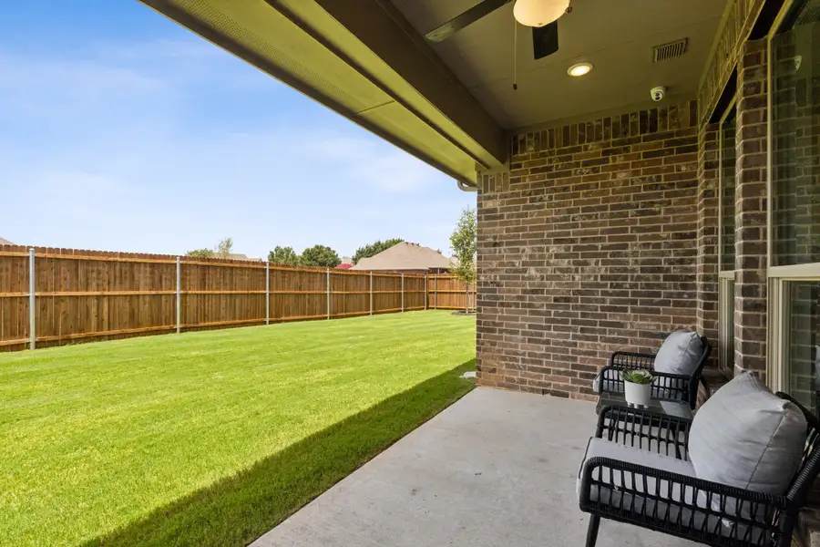 Exterior details and patio area of a home in Belle Meadows, Cleburne (Image 3).