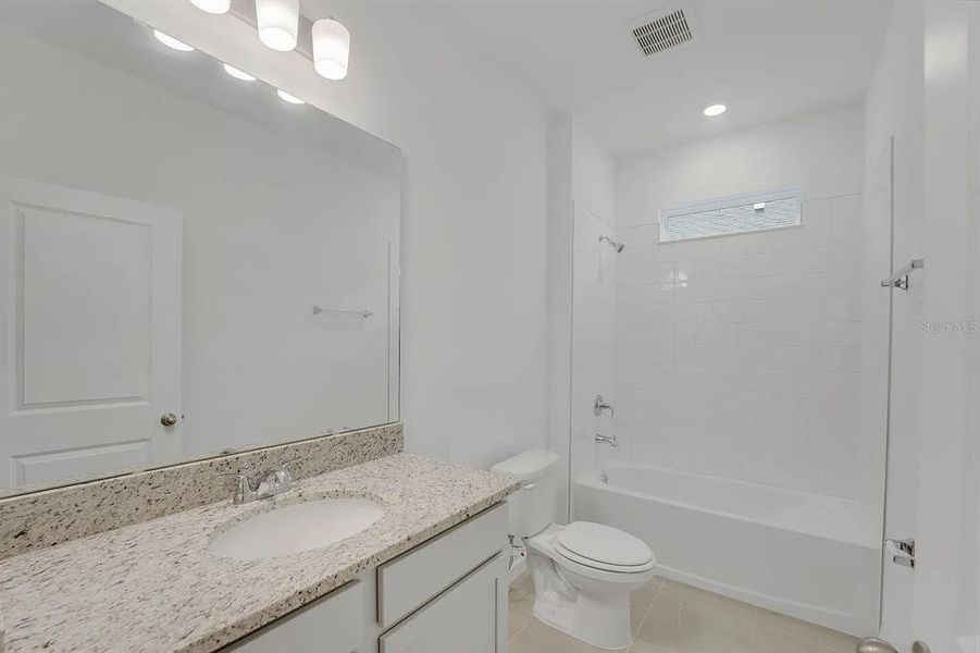 Furnished interior view inside a new home in Cypress Park Estates, Haines City (Image 10).