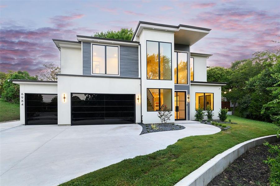 Front exterior of a new home in , Dallas, TX, highlighting curb appeal (Image 1). Front exterior of a new home in , Dallas, TX, highlighting curb appeal (Image 1).