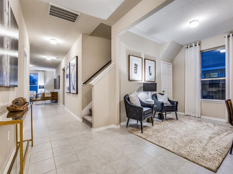 *Model Representation - Flexible living space off entryway, can be used as a study