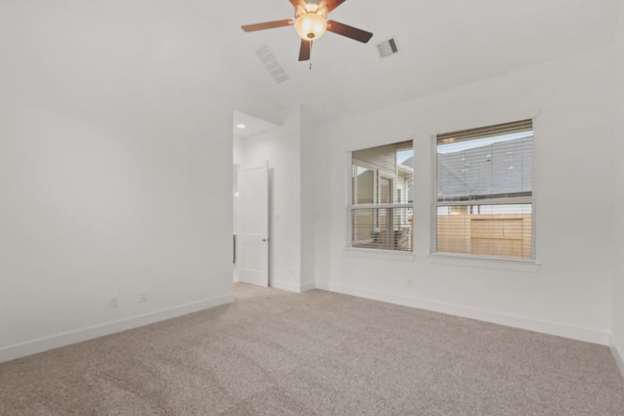 Representative unfurnished interior of a home built from the Mickelson by Chesmar Homes in Riceland Alley Loads, Mont Belvieu (Image 104).