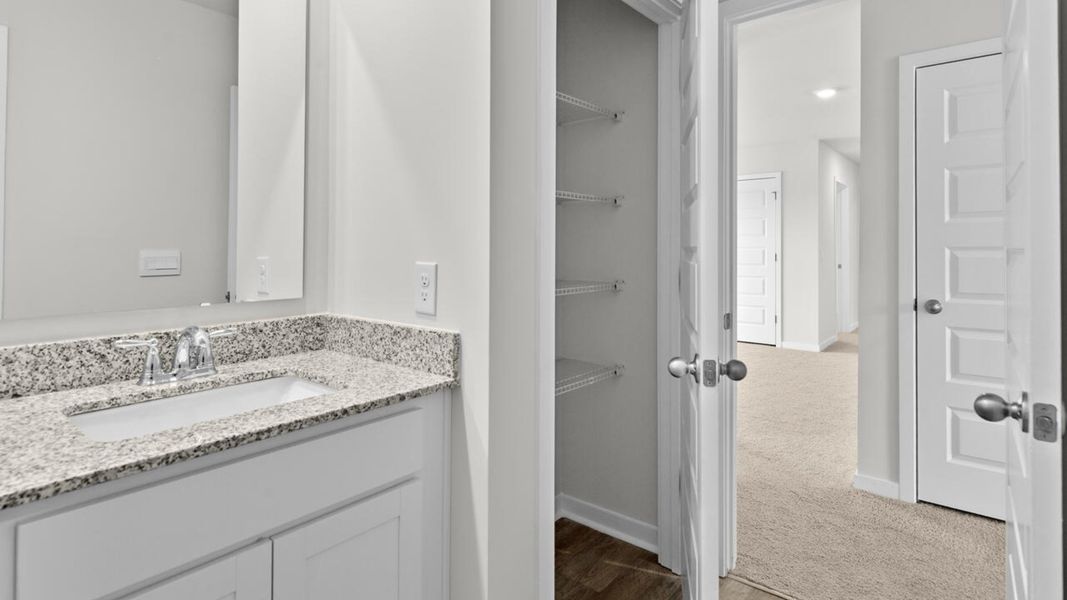 Furnished interior view inside a new home in Sidbury Station, Castle Hayne (Image 11).