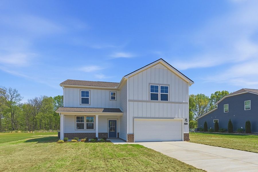 A house with a garage. A house with a garage.