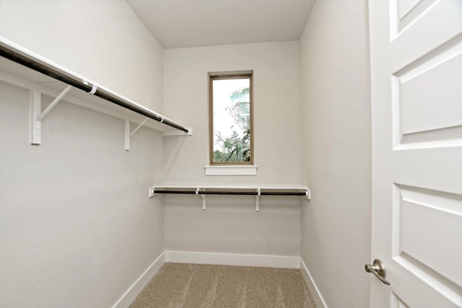 Spacious, unfurnished interior of a new home in The Hollows on Lake Travis, Leander (Image 29).