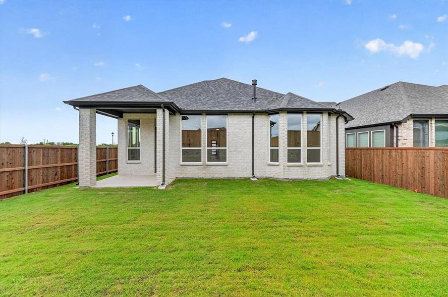 Exterior details and patio area of a home in Wellington, Haslet (Image 2).