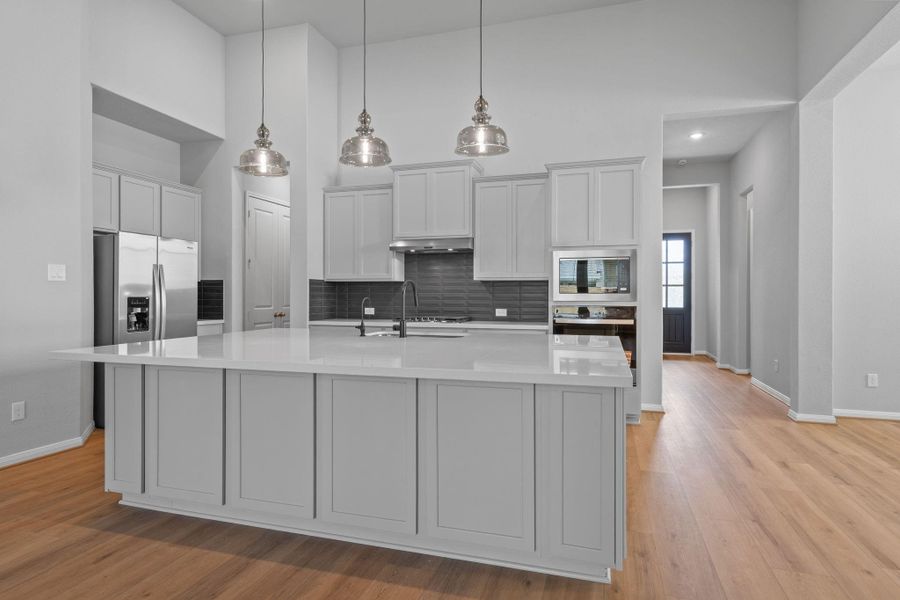 Furnished interior view inside a new home in Bridgeland 55', Cypress (Image 7).