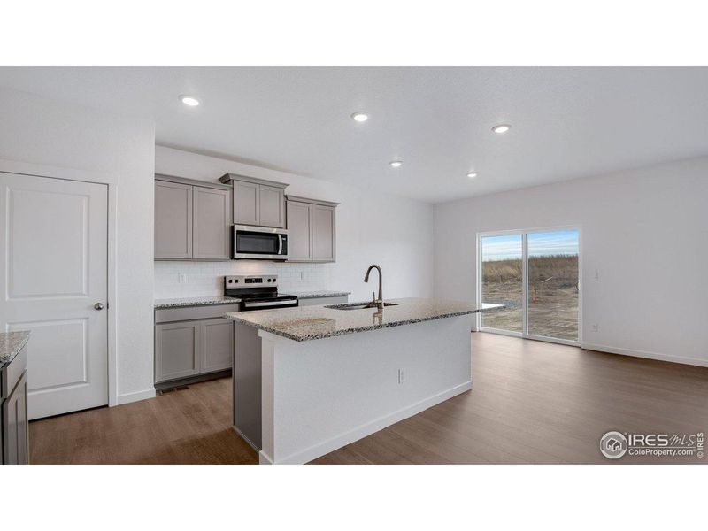 Furnished interior view inside a new home in Vista Meadows, Fort Lupton (Image 3).