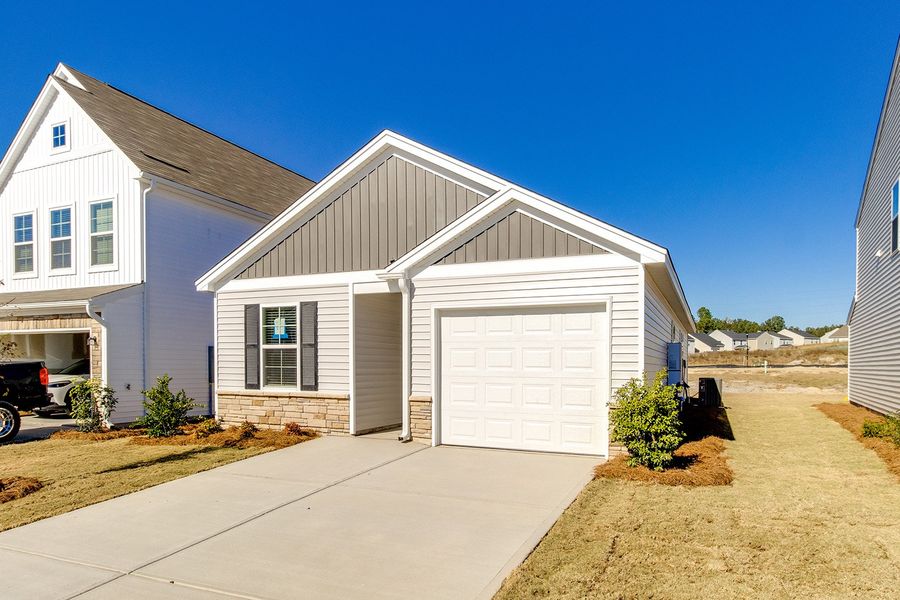Front exterior of a new home in Bluefield, Lexington, SC, highlighting curb appeal (Image 2). Front exterior of a new home in Bluefield, Lexington, SC, highlighting curb appeal (Image 2).