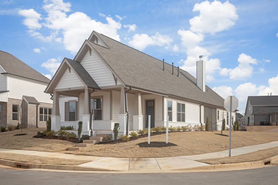 Front exterior of a new home in Twin Oaks, Oakland, TN, highlighting curb appeal (Image 28). Front exterior of a new home in Twin Oaks, Oakland, TN, highlighting curb appeal (Image 28).