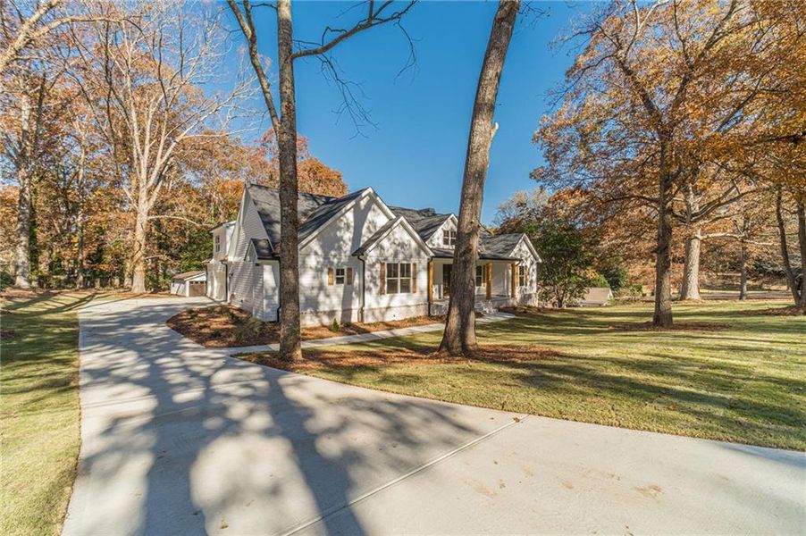 Front exterior of a new home in , Monroe, GA, highlighting curb appeal (Image 36).