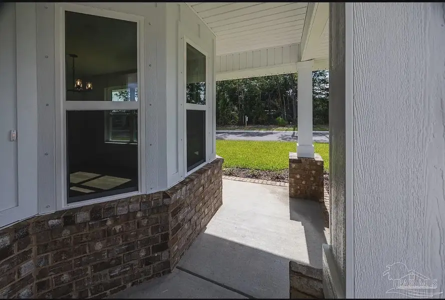 Exterior details and patio area of a home in Hidden Pines, Milton (Image 4).