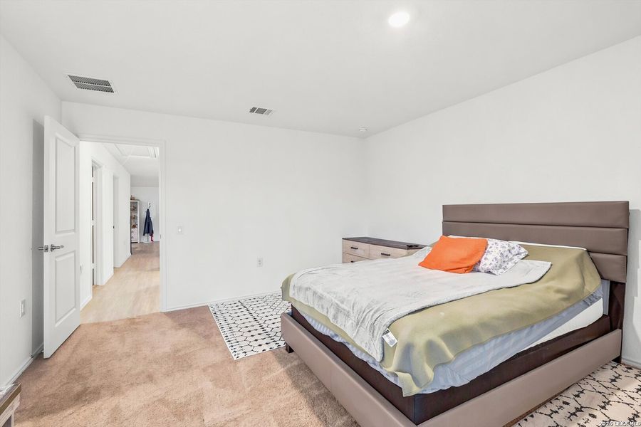 Furnished interior view inside a new home in Tarasco Gardens, San Antonio (Image 6).