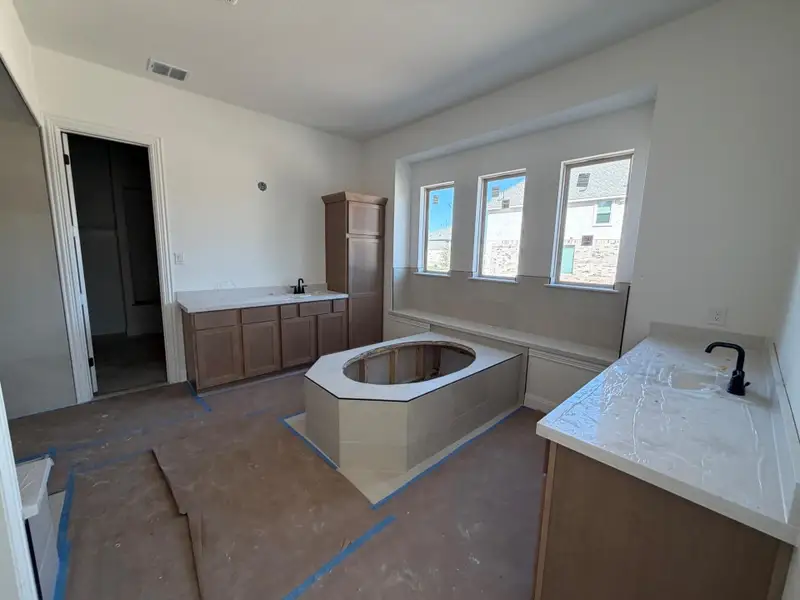 In-progress construction of a new home in Hawkes Landing, Leander, TX (Image 11).