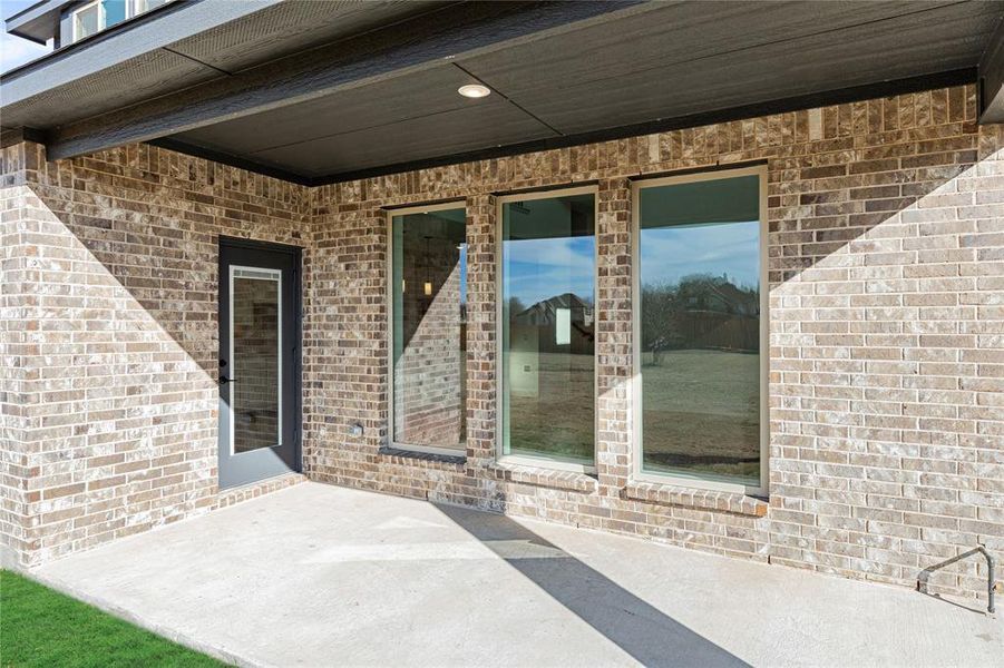 Exterior details and patio area of a home in Crystal Lake Estates, Red Oak (Image 4).