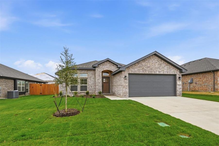 Front exterior of a new home in Trail Creek, Cleburne, TX, highlighting curb appeal (Image 2). Front exterior of a new home in Trail Creek, Cleburne, TX, highlighting curb appeal (Image 2).
