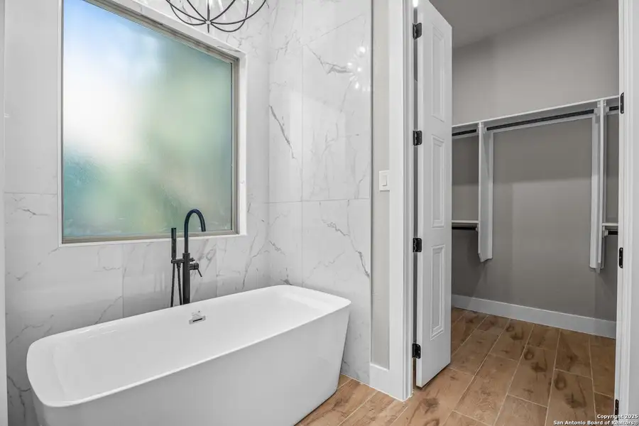 Furnished interior view inside a new home in , Spring Branch (Image 9).