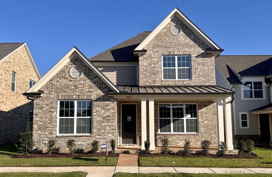 Front exterior of a new home in Lockwood, Collierville, TN, highlighting curb appeal (Image 1). Front exterior of a new home in Lockwood, Collierville, TN, highlighting curb appeal (Image 1).