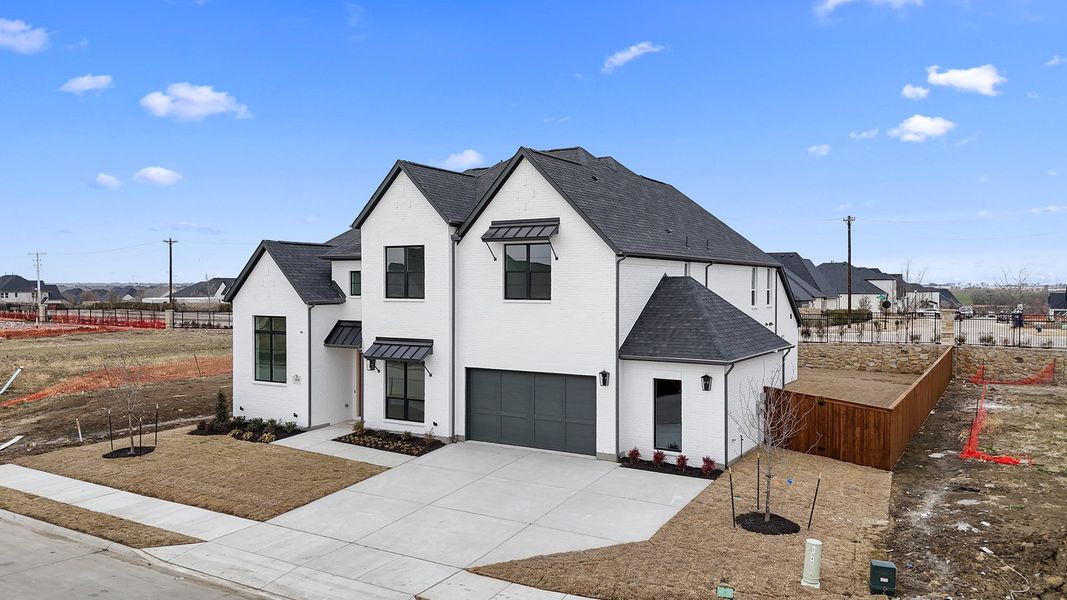 Front exterior of a new home in Park Place - 80' Lots, Prosper, TX, highlighting curb appeal (Image 2). Front exterior of a new home in Park Place - 80' Lots, Prosper, TX, highlighting curb appeal (Image 2).