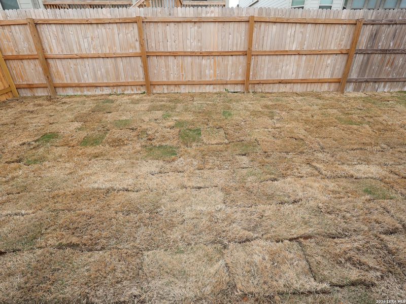 Exterior details and patio area of a home in Greenspoint Heights, Seguin (Image 24).