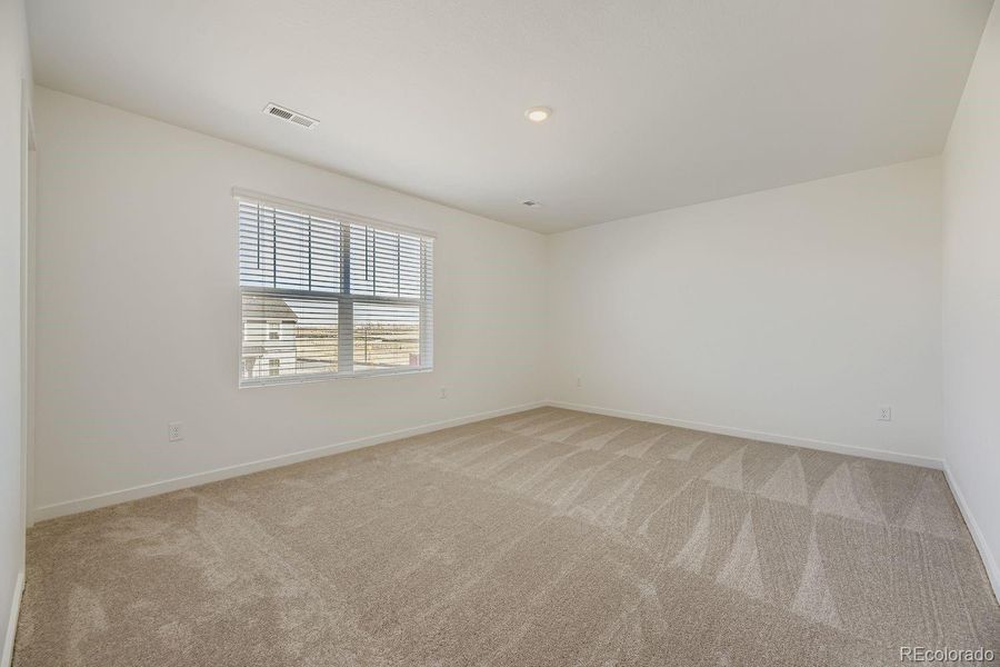 Spacious, unfurnished interior of a new home in Eastcreek Farm: The Camden Collection, Thornton (Image 10).
