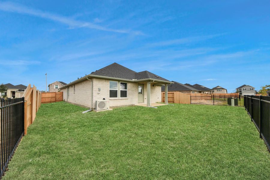 Exterior details and patio area of a home in Laurel Landing: Founders Collection, Alvin (Image 19).