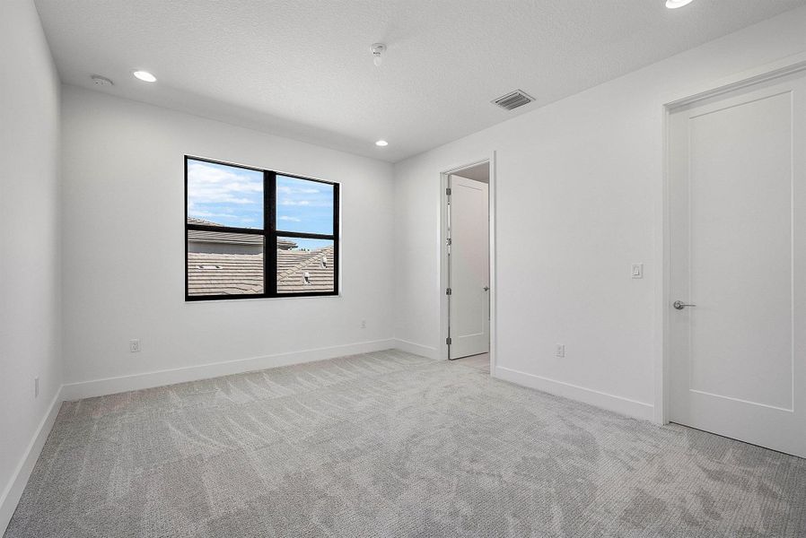 Spacious, unfurnished interior of a new home in Lotus Edge, Boca Raton (Image 57).