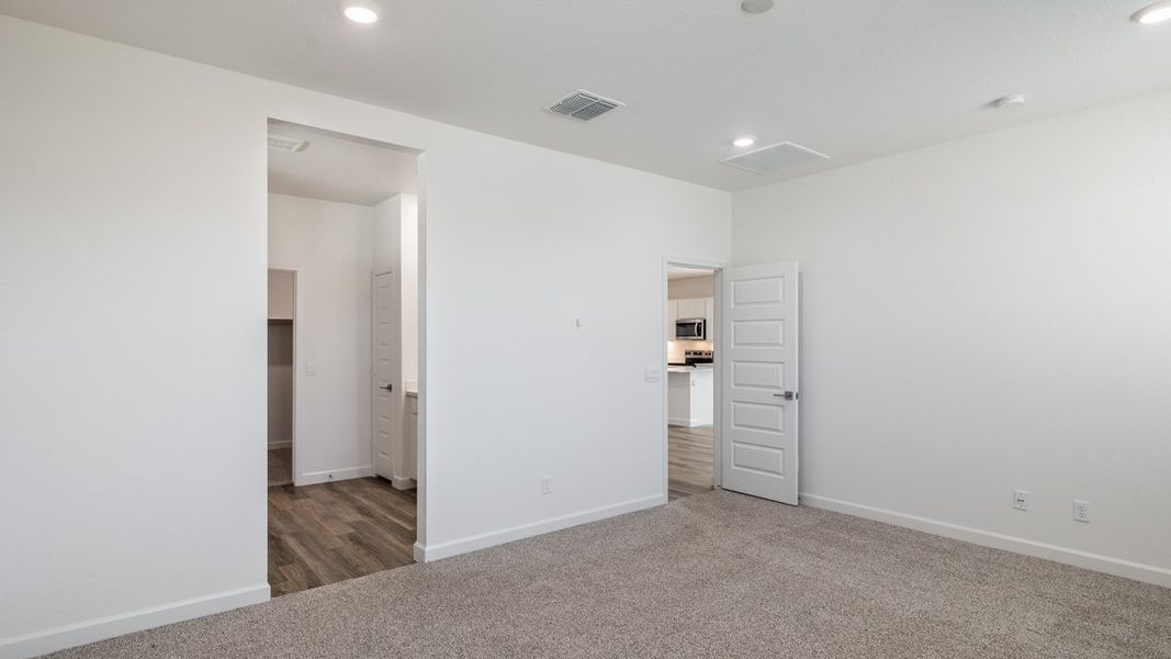 Spacious, unfurnished interior of a new home in Zanjero Pass, Waddell (Image 25).