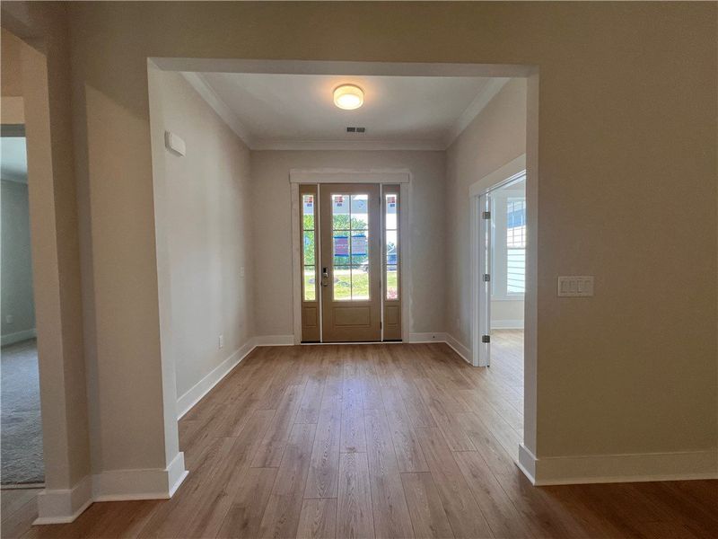 Step into this inviting entryway, featuring durabl