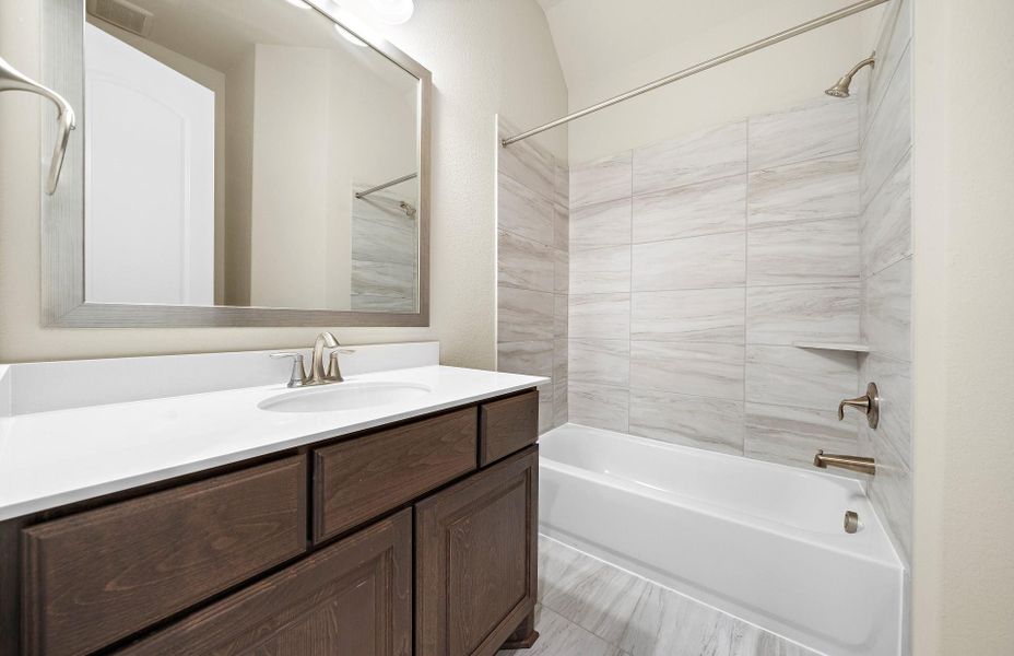 Furnished interior view inside a new home in The Woodlands Hills 65′, Willis (Image 17).