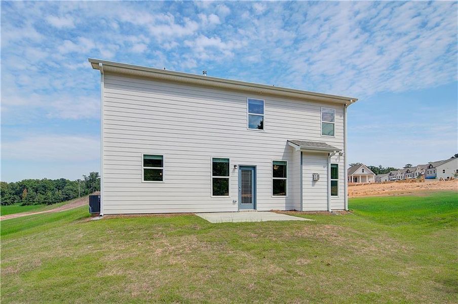 Exterior details and patio area of a home in Abbotts Crossing, Conyers (Image 3).