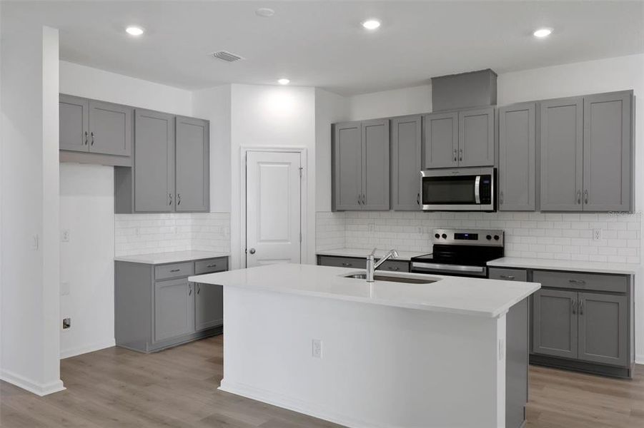 Furnished interior view inside a new home in Seaport Village, Tavares (Image 13).