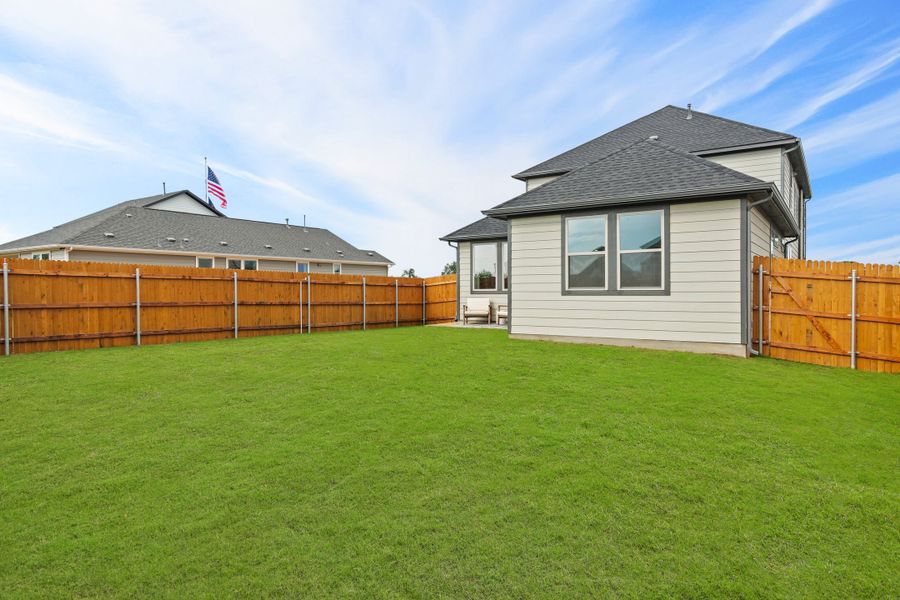 Backyard in the Oak home plan by Trophy Signature Homes – REPRESENTATIVE PHOTO Backyard in the Oak home plan by Trophy Signature Homes – REPRESENTATIVE PHOTO