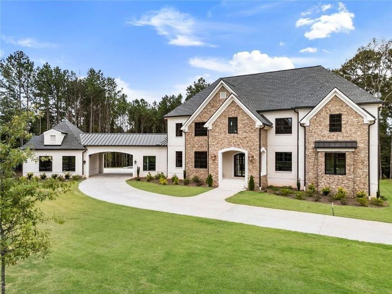Front exterior of a new home in , Milton, GA, highlighting curb appeal (Image 27). Front exterior of a new home in , Milton, GA, highlighting curb appeal (Image 27).
