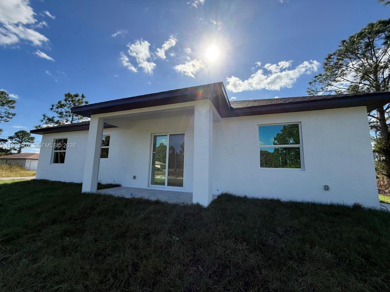Exterior details and patio area of a home in , Lehigh Acres (Image 18). Exterior details and patio area of a home in , Lehigh Acres (Image 18).