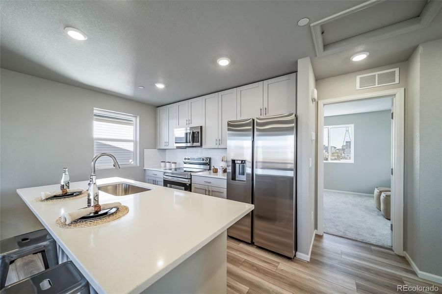 Furnished interior view inside a new home in , Commerce City (Image 9).
