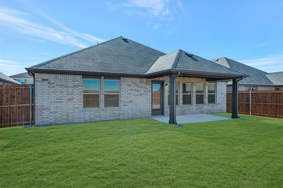Exterior details and patio area of a home in Verandah, Royse City (Image 21).
