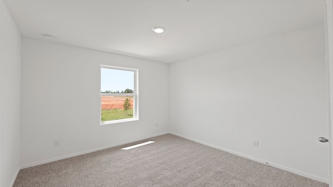 Representative unfurnished interior of a home built from the Davis by D.R. Horton in Lake Conroe Cove, Willis (Image 18).